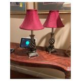 Set of two lamps 17 1/2 inches tall with burgundy shades. The base has a silver and bronze twist look.