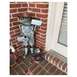 Metal frog and fire hydrant yard decor.  the frog is 36 inches tall. The fire hydrant is 15 inches tall.
