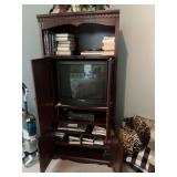 Cherry media cabinet 35“ x 21“ x 74“. Contents not included.