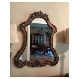 Large Ornate Baroque bronze and black mirror. 34” x 42”.