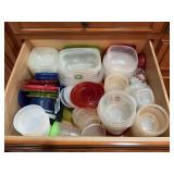 Contents of bottom, two drawers in kitchen. See photos, plastic ware and jars.