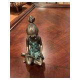 Bronze statue of a girl reading by SPI 4 1/2” x 7”