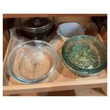 Four covered casserole dishes, and a corning ware bowl. Some are vintage.