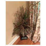 Floral arrangement in metal vase, spans 30” x 52”