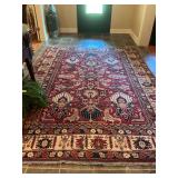Turkish multicolored wool rug in red’s blues and creams. Excellent condition. 90” x 128”.