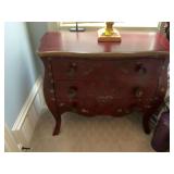 Red with gold floral Bombay style chest 35” x 16” x 30”