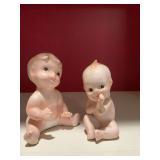 Two vintage bisque Kewpie dolls. 3 1/2 inches and 3 inches. See photos for finger damage