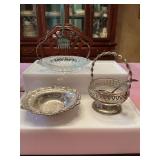 Three apertizer serving pieces and a silver plated spoon