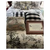 2 16 in.² black-and-white checked pillows, 16 by 15 inch bunny, rabbit pillow and a 17 1/2 x 15” cross stitched daughter framed piece