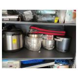 Contents of second shelf in cabinet in garage