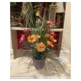 Faux floral arrangement in concrete pot. Measures approximately 23“ x 20“
