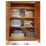 Contents of Tupperware and plasticware in cabinet right of microwave. See photos.
