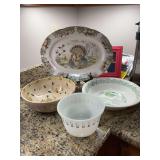 Group of vintage bowls and platters. 16 1/2 inch turkey platter- does have one chip., 10 and 12 inch bowl and a 7 inch milk glass wheat mixing bowl with pour spout