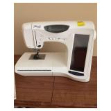 Pacesetter by brother sewing machine, and cabinet 32“ x 21“ x 29 1/2“. Cabinet does have a lift up table on back also.