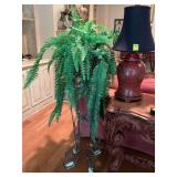 Faux fern in metal plant stand. Stand is 16“ x 49“.