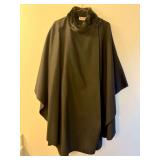Vintage Betmar New York black wool cape featuring a plush faux fur collar