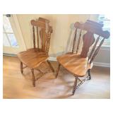 Two Spindle-Style Maple Dining Chairs