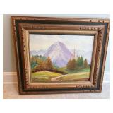 Painted Alpine Mountain Landscape on Canvas sitting in a Ornate Wood Carved Green/Gold Molding