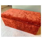 Rust Orange crushed velvet rectangular storage ottoman and Soft items inside including blankets