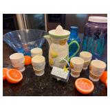 Napcoware Porcelain Juice Set, Orange Candles and Plastic Ware