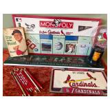 St. Louis Cardinals items including Unopened Monopoly Game, Retired Numbers Wall Pad Canvas, Stan Musial Book, License Plate and More