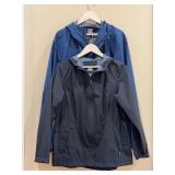 (2) 32° Cool hooded outerwear garments - women’s M rain jacket and men’s XL rain jacket