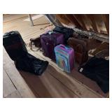 Large assortment of various sizes and styles of luggage - some are leather but all are in used condition