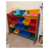 Primary Toy Storage Organizer featuring a durable natural wood frame with 16 removable colorful plastic bins in red, blue, green, and yellow for easy toy sorting