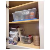 Contents of laundry room closet - candles, candleholders, crafting frames, brass cleaning kit, shoeshine supplies
