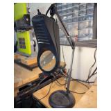 Cast base magnifying lamp with flexible arm - working condition