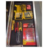 Drawer full of Allen wrenches, jig saw blades and bits