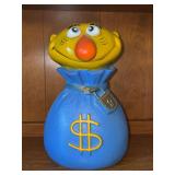 Vintage 1971 "Mr. Money Bags" character coin bank manufactured by Play Pal Plastics - very small amount of change inside