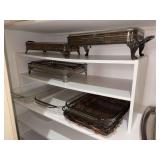 (3) shelves of clear PYREX casserole dishes and (3) silverplate casserole warmers