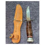 Vintage fixed-blade hunting knife with a stacked-leather handle with leather scabbard - needs TLC