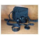 Nikon N50 35MM Camera - does power up - comes with Eagle Creek canvas carry bag