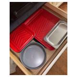 Contents of kitchen drawer below oven