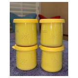 Set of (4) sunny yellow La Fermière ceramic yogurt pots feature a charming embossed sun design and matching yellow lids - 3 are marked and were used for spices - 3-1/4” tall
