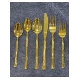 (4) 6-piece place settings of National Escapade gold-tone bamboo stainless flatware - total of 24 pieces - dinner forks, salad forks, knives, soup spoon, teaspoon and tablespoon
