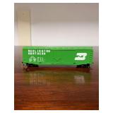 Vintage Tyco HO scale Burlington Northern plug-door boxcar (Road Number BN 100024) - there is something inside but did not want to risk damage to boxcar to retrieve