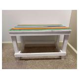 Small white wooden bench with primary color slatted top - 24 x 14 x 16 tall