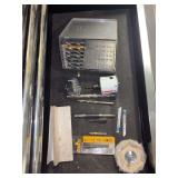 Contents of tool box drawer - drill bits and other