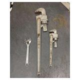 Grouping of (3) hand tools - SCHICK 14” pipe wrench, SCHICK 24” pipe wrench and a RIDGID 10” crescent wrench