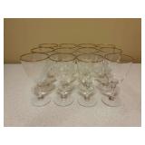 Set of (12) vintage crystal stemware features a clear flared bowl accented with a delicate gold rim on a faceted stem - 6” tall - includes quilted storage box