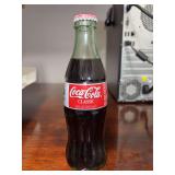 Vintage 1997 Coca-Cola Classic 8 oz glass bottle commemorating the 50th anniversary of Jackie Robinson breaking Major League Baseball