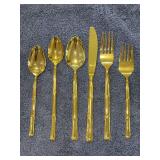 (4) 6-piece place settings of National Escapade gold-tone bamboo stainless flatware - total of 24 pieces - dinner forks, salad forks, knives, soup spoon, teaspoon and tablespoon