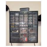 Assorted hardware plastic storage cabinet - will need to bring Phillips head screwdriver to remove from wall - 14-1/4 x 6 x 16 tall