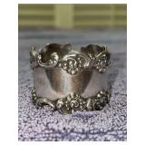 Sterling silver napkin ring features an ornate repoussé Rococo or Art Nouveau scroll and floral border - monogrammed - stamped 8650 - 31.08 grams