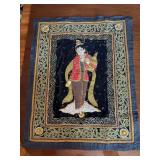 Vintage Burmese Kalaga wall hanging featuring a traditional hand-embroidered figure embellished with metallic threads, beads, and sequins on a black velvet background