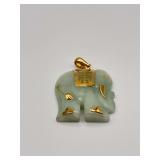 Carved Jade Elephant Pendant With 14k Yellow Gold Accents