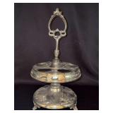 Antique silver-plated carousel cruet stand, featuring an ornate handle and circular tiered rings for holding condiment bottles - 15” tall